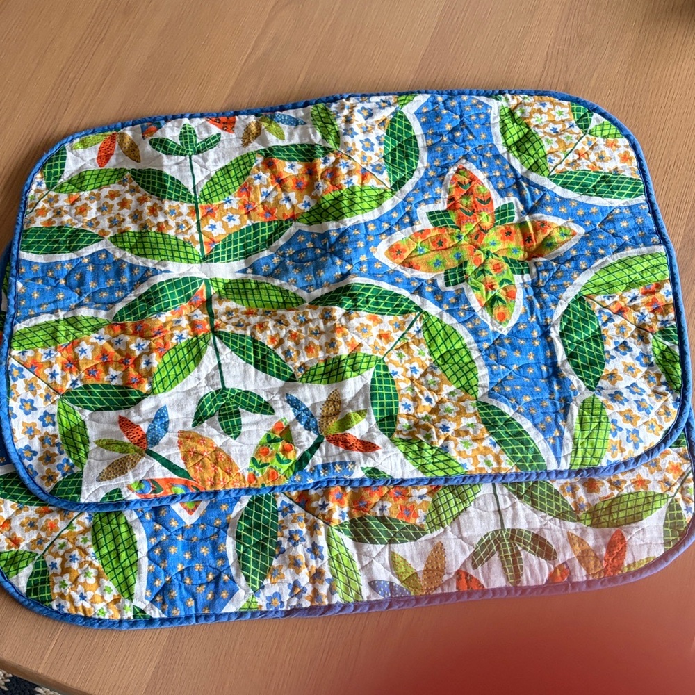 Vintage set of two quilted 70s flower power pillowcases